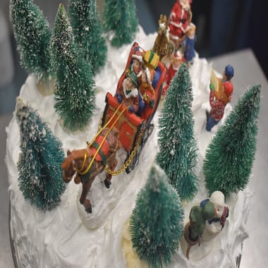 Royal Icing on Christmas cake with Christmas decorations
